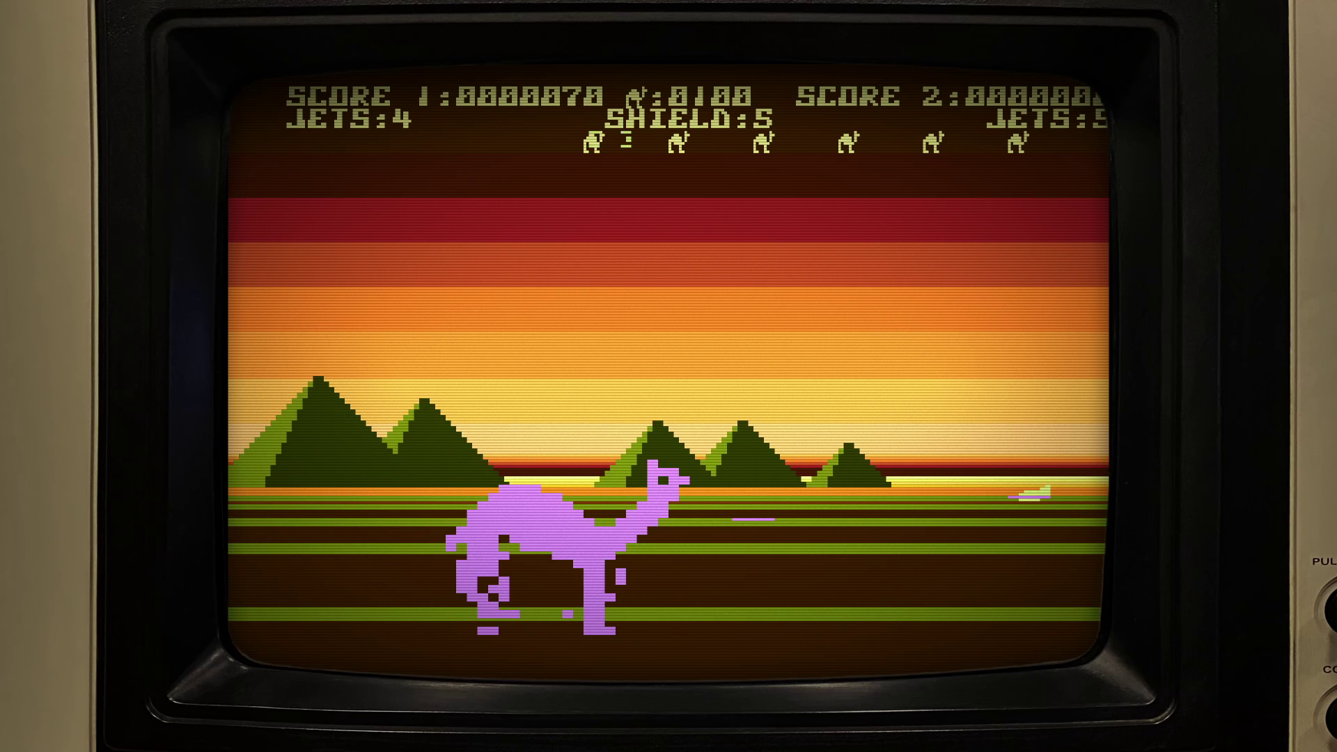 A ship takes aim at a camel in Attack of the Mutant Camels.