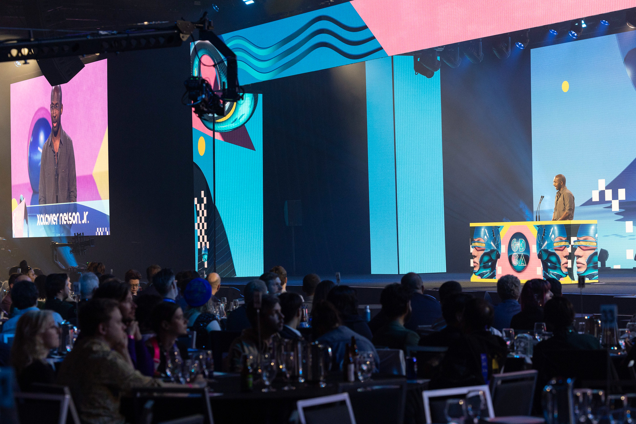 Xalavier Nelson Jr. gives a speech at Game Developers Conference 2024.