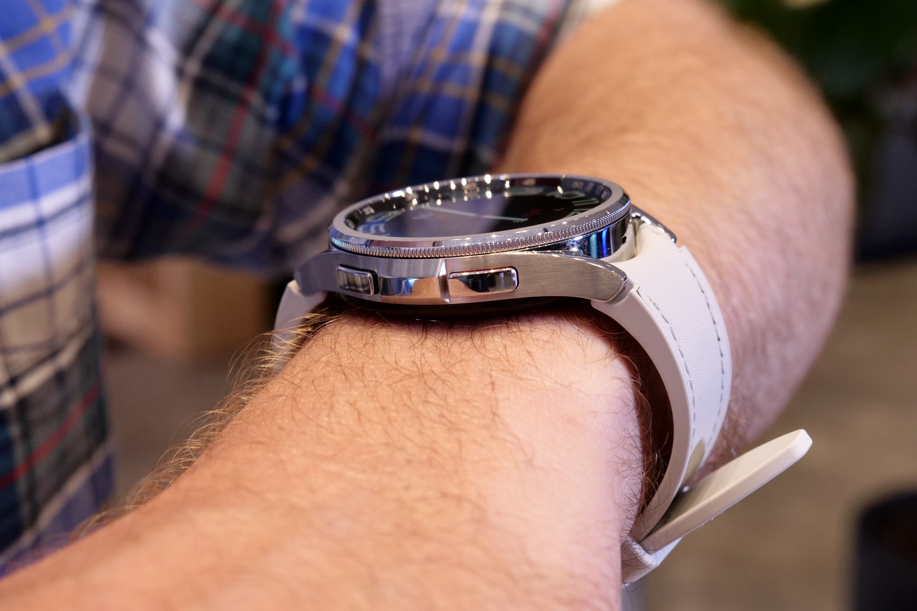 A person wearing the Samsung Galaxy Watch 6 Classic.