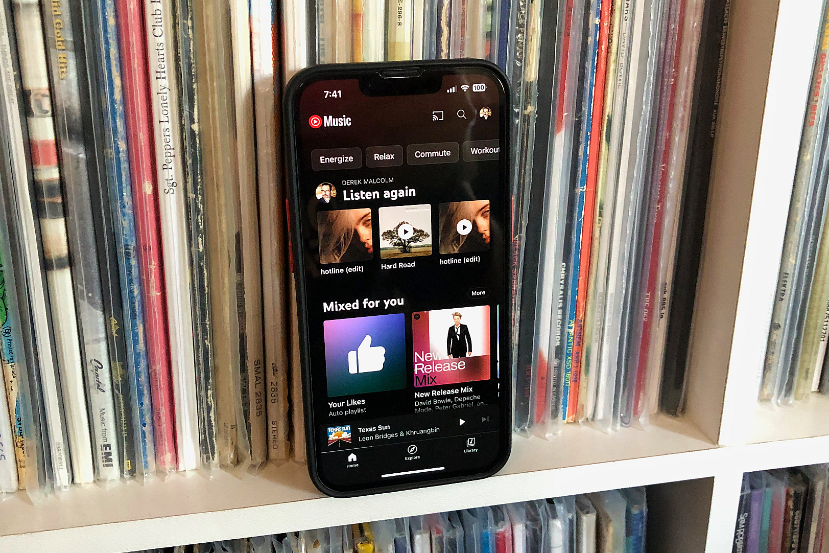 An iPhone with the YouTube Music app on ⁢it.